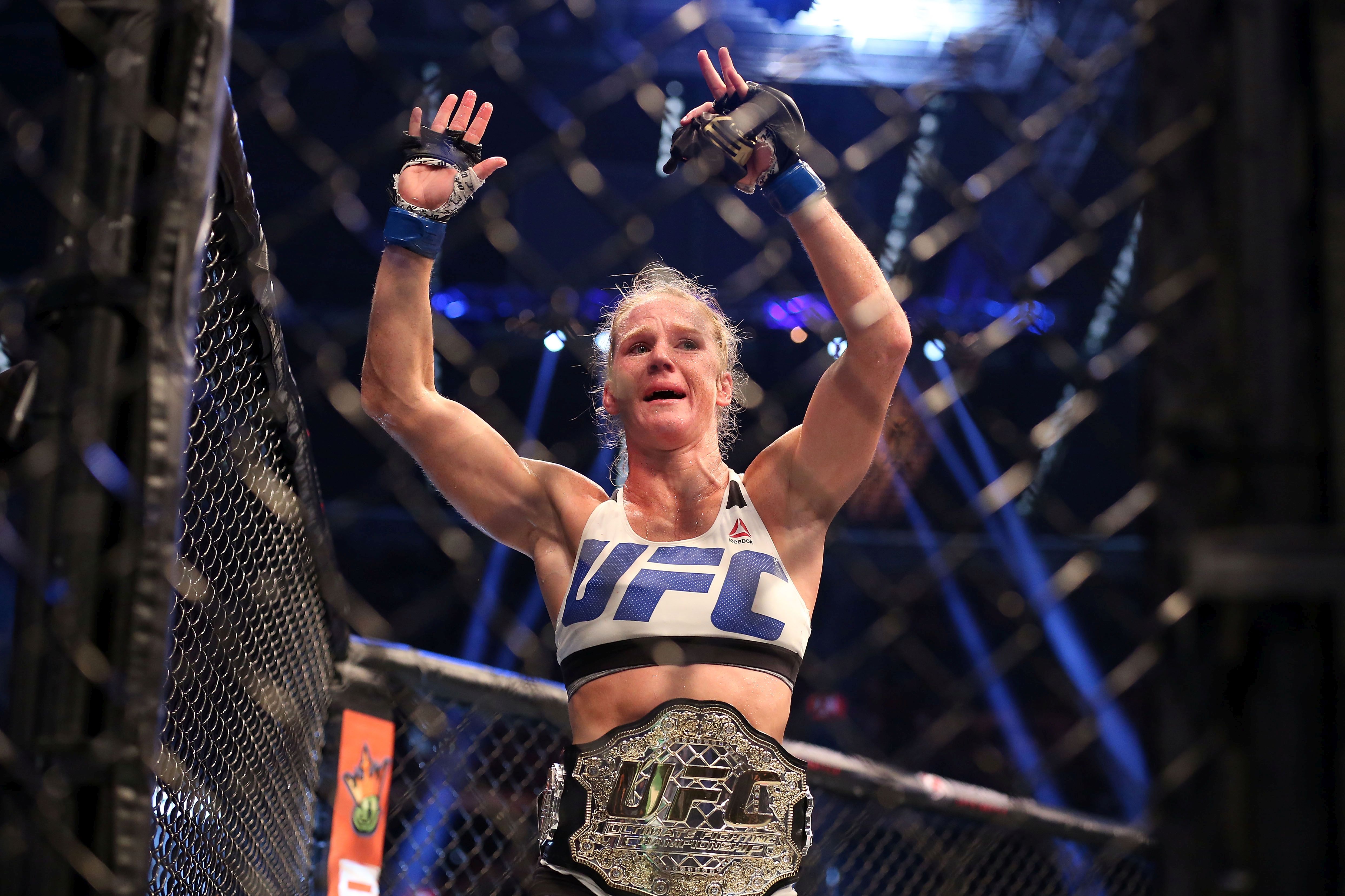MELBOURNE, AUSTRALIA - NOVEMBER 15: Holly Holm of the United States celebrates victory over Ronda Rousey of the United States in their UFC women's bantamweight championship bout during the UFC 193 event at Etihad Stadium on November 15, 2015 in Melbourne, Australia. (Photo by Quinn Rooney/Getty Images)