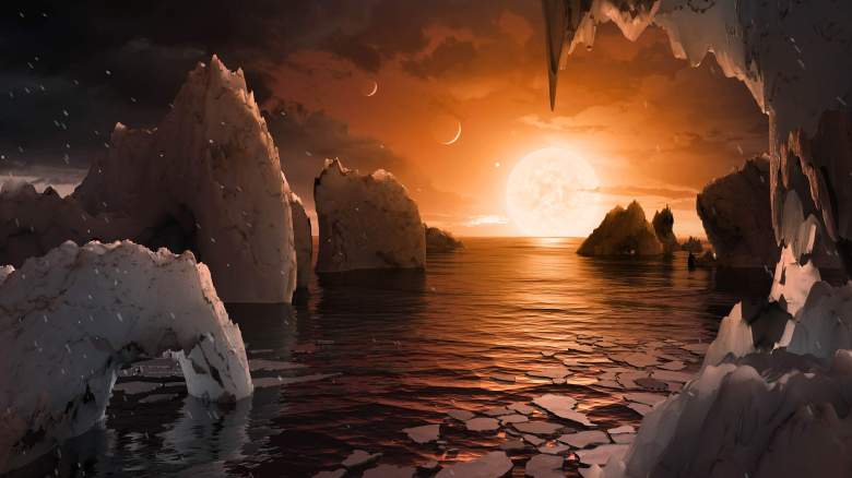 El concepto de este artista muestra una imagen de lo que se podría ver si estuvieras parado en la superficie del exoplanet TRAPPIST-1f.  (NASA/JPL-Caltech)